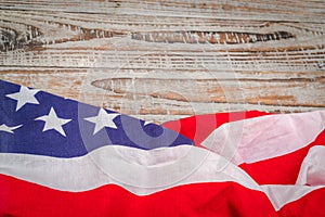 American flag on wood background .