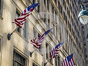 American flags at building in the center of New York City