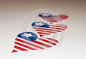 American flags heart shaped. Love icon of the american flags. In memoriam of 4th of July with patriotic USA flags heart shaped.