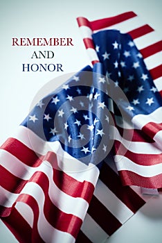 American flags and text remember and honor