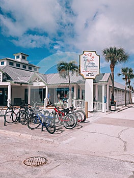 American Florida beach side restaurant Palm Pavilion with palms around.