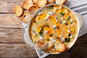 American food: hot chicken buffalo dip close-up in a baking dish