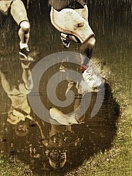 American Football Action Scene under rain