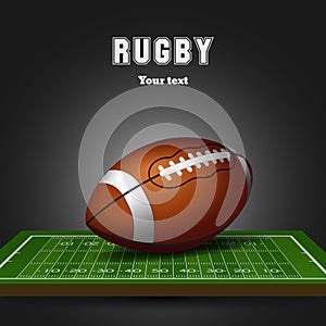 American football ball on field. Rugby black background