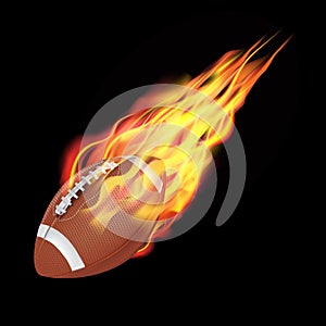 American football ball in fire