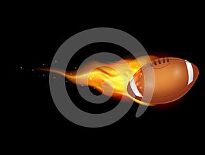 American football ball fire on black background