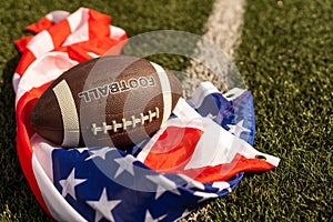 american football ball and flag