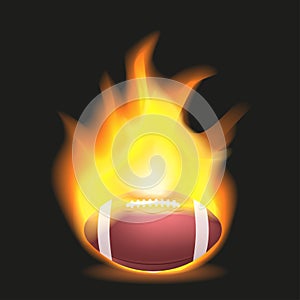 American football ball with flaming fire on a black background.