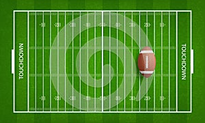 American football ball on football field pattern background.