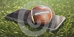 American football ball put on smartphone in lush grass closeup