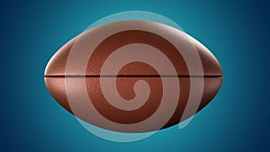 American football ball rotating in motion on blue screen. Looped American football 3d Animation. 3d. 4K