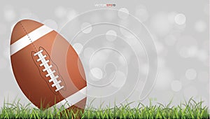 American football ball or rugby football ball on green grass court with light blurred bokeh background. Vector