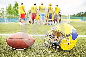 American football eqipment on grass photo