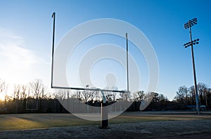 An American Football Field with Goalpost late on a Sunny Day