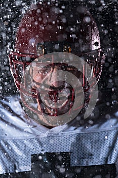 American Football Field: Lonely Athlete Warrior Standing on a Field Holds his Helmet and Ready to Play. Player Preparing