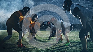 American Football Field Two Teams Face-off. Players Ready to Start Run, Attack, Score Touchdown