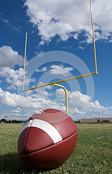 American Football with goal posts