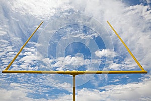 American football goal posts - blue sky & clouds