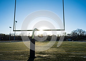 An American Football Goalpost late in the Day with a Blue Sky photo