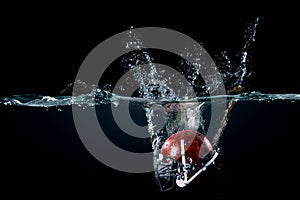 American football helmet in water