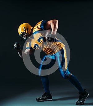 American football offensive player with ball