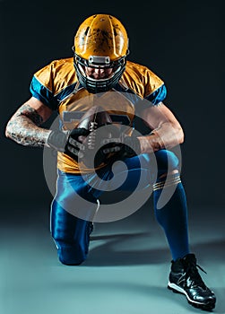 American football offensive player with ball