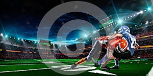 American football player in action on stadium photo