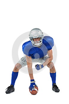 American football player in attack stance