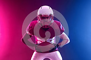 American football player. Banner with neon colors.