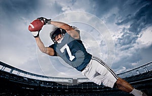 American Football Player Catching a touchdown Pass