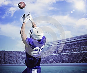 American Football Player Catching a touchdown Pass