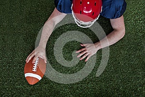 American football player scoring a touchdown