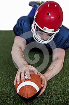 American football player scoring a touchdown