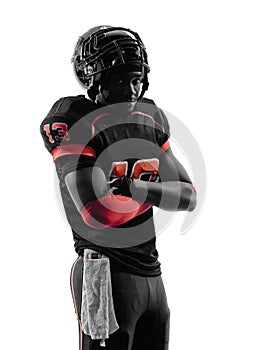 American football player standing arms crossed silhouette