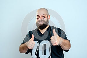 American football player with thumbs up