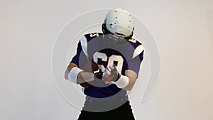 American Football Player wearing his sport dress on Black Background