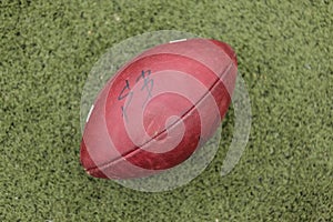 American football rugby ball on grass