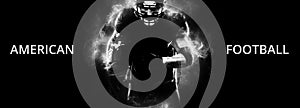 American football sportsman player on black background running in action. Sport wallpaper with copyspace.