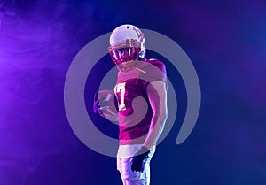 American football sportsman player in neon colors