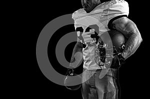 American football sportsman player on stadium with lights on background