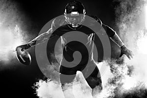 American football sportsman player on stadium. Sports banner and wallpaper with copyspace.