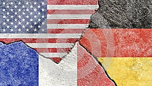 American, French, and German flag on a cracked background-politics, war concept