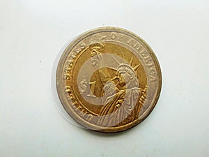 American golden One Dollar on white