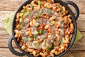 American Hamburger Goulash with Elbow Macaroni closeup in the pan. Horizontal top view