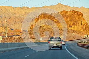 American highway with cars, rear view