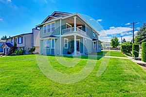 American house with walkout deck. Backyard view