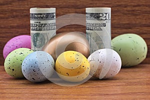 American investment symbolized with gold egg and colorful diversified eggs