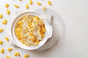 American mac and cheese, macaroni pasta in cheesy sauce