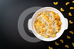 American mac and cheese, macaroni pasta in cheesy sauce