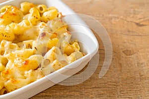 American mac and cheese, macaroni pasta in cheesy sauce